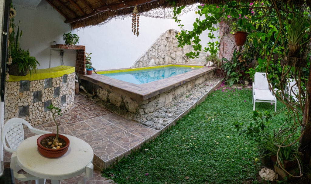 Spacious open-concept living room in Cozumel with natural Caribbean breeze - Casa Chentuk interior.